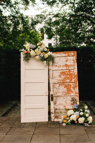 old door wedding decoration white vintage and flowers wedding background jeanne mitchum photography