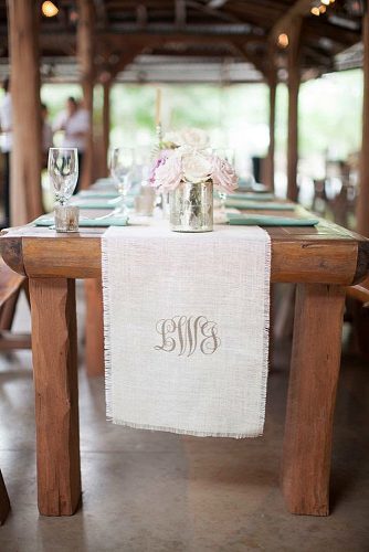 wedding monogram on a wooden table a linen cloth with a monogram kelly hornberger