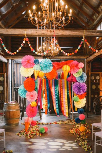 wedding taco bar in a wooden barn a bright mexican arch lara hotz
