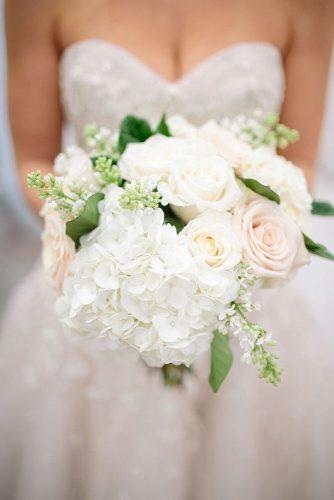blush wedding bouquets with roses in the hands of the bride troy grover photographers