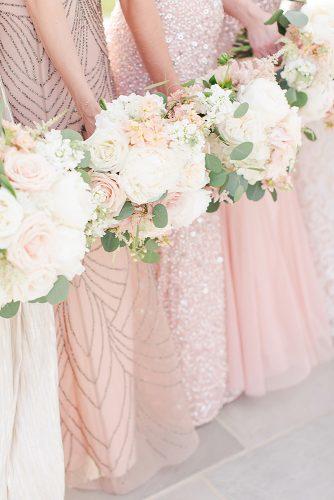 blush wedding bouquets with roses in the hands of the bridesmaids katelyn james photography