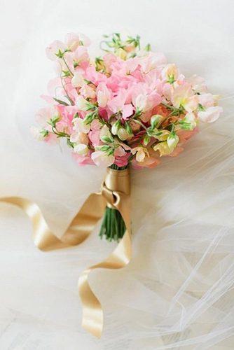 popular-wedding-flowers-small-bridal-bouquet-of-sweet-peas-erin-kate-photo