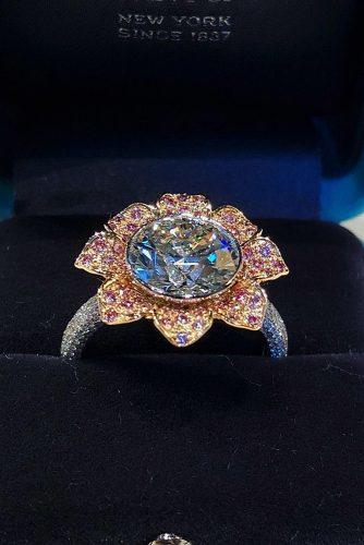 engagement ring trends flower halo round cut vintage