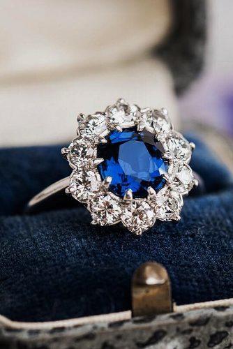 engagement ring trends round cut sapphire floral halo