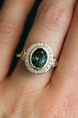 engagement ring trends vintage oval cut halo gold