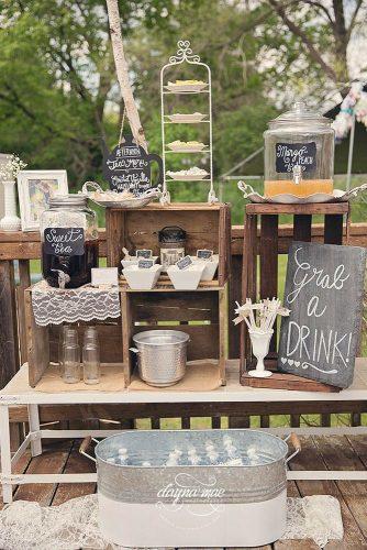 wooden crates wedding ideas bar with drinks from boxes decorated with lace napkins dayna mae photography