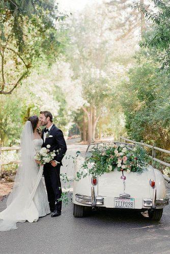 wedding photographers white car with flowers josevilla
