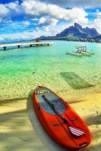 best adventure honeymoon spots red kayak on the beautiful beach in bora bora good