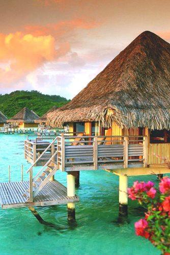 best honeymoon spots island peach clouds and pile house in bora bora