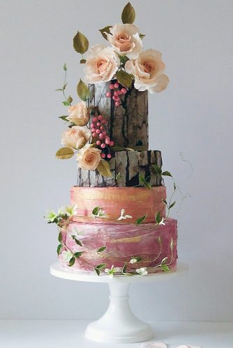 woodland themed wedding cakes with bark of roses pink roses and red berries cake trends via instagram