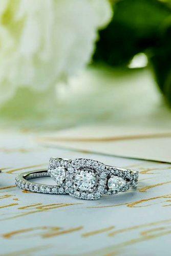 zales engagement rings on the table with white flowers