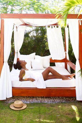 cheap honeymoon ideas afroamerican girl with hat shea powell