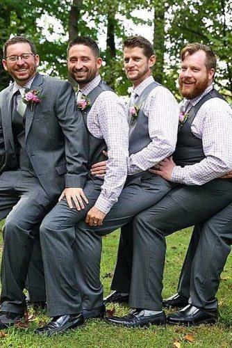 awkward wedding photos groomsmen in unusual poses equinox photography