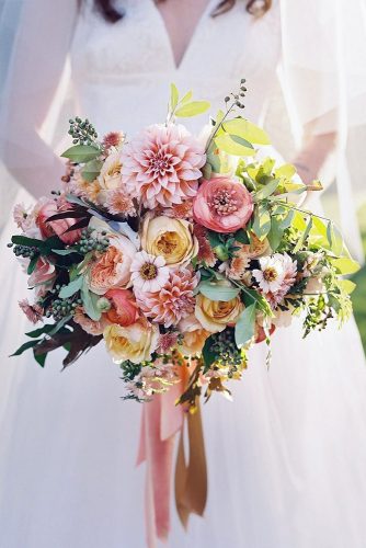 blush wedding bouquets lush bouquet with dahlias roses other flowers and greens karen hill photography via instagram