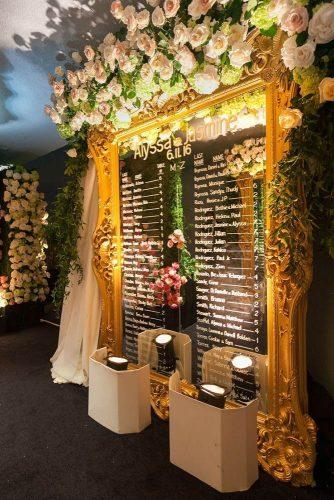 mirror wedding ideas mirror in gold frame save the date table settind with flowers simone photography