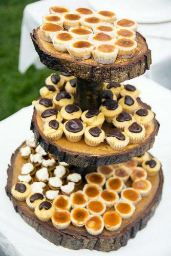 rustic barbecue bbq wedding cakes on a wooden stand olivia christina photography