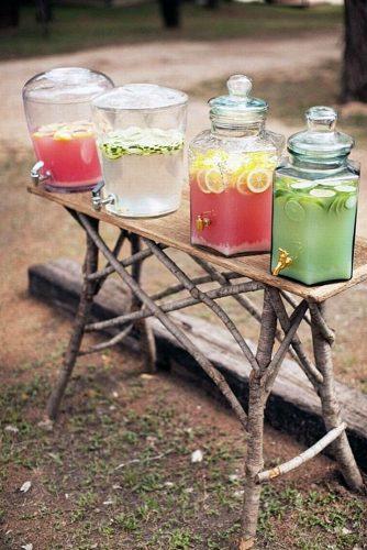 rustic barbecue bbq wedding different kinds of lemonade on a table made of wooden branches easton events