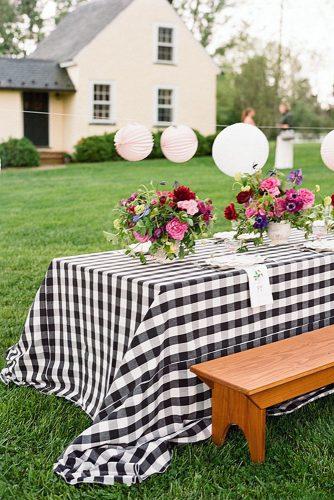 rustic barbecue bbq wedding reception with flowers and checkered tablecloth karen hill