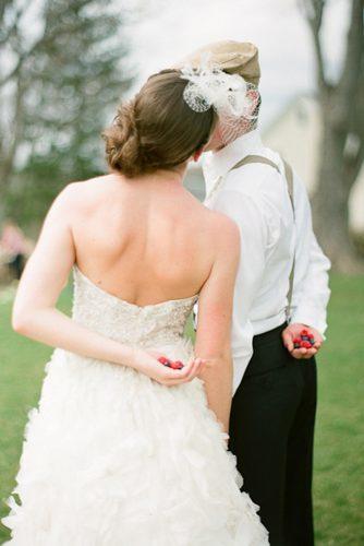 themed wedding photos hunger games bride and groom with berries carmen santorelli photography