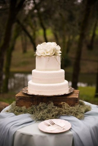wooden crates wedding white cake on wooden boxes decorated with moss jess flood events