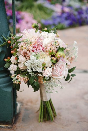 blush wedding bouquets small with dahlias roses and greenery brooke schultz photography via instagram