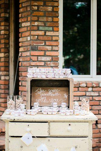rustic barbecue bbq wedding on a vintage chest of drawers a wooden box with an inscription and sweets heather selzer via instagram