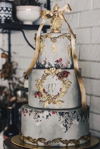 wedding monogram gray cake with gold flowers and monogram winifred kristé cake via instagram