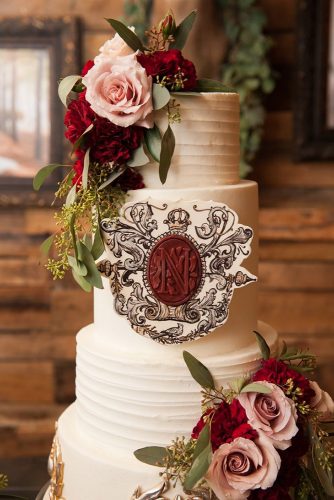 wedding monogram white cake decorated with roses with monogram holli b photography