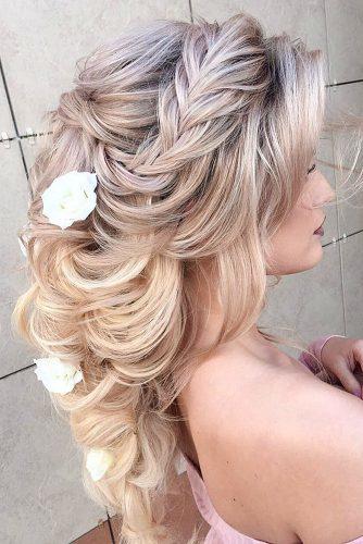 elstile wedding hairstyles half up half down with braids and flowers elstilespb via instagram