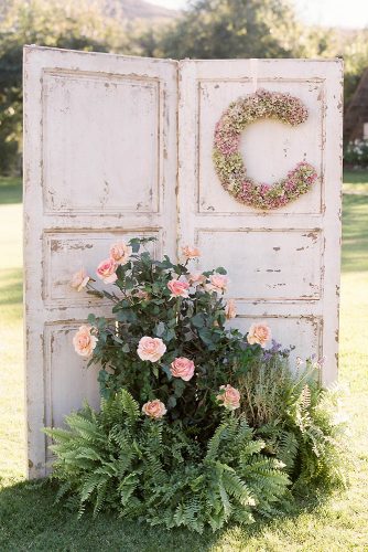 old door wedding decoration door with monogram and flowers braedon photography