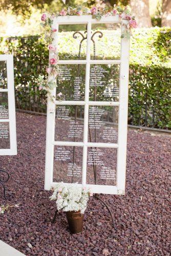 old door wedding decoration ideas table plan on a white glass door michael anthony photography