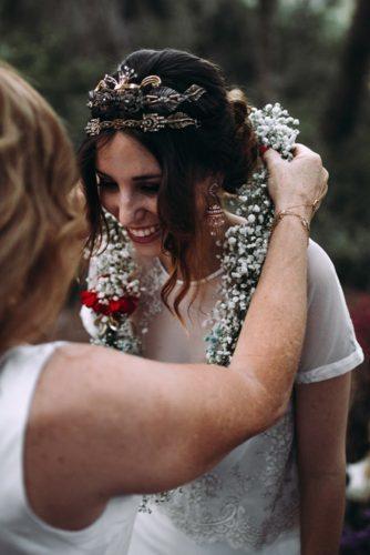 bride wearing a wreath of flowers lorena erre photography