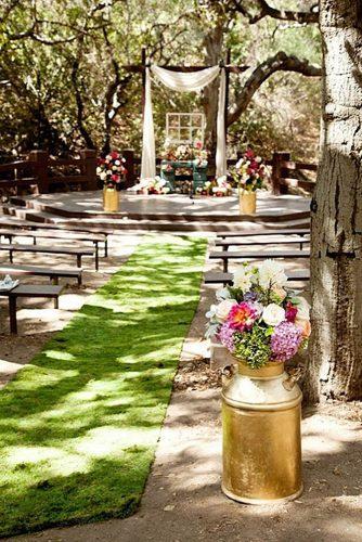 rustic backyard wedding cozy ceremony decorated with flowers flower allie