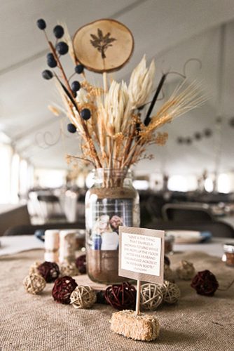 western wedding decoration a table adorns a jar with spikelets and wooden ornaments one eleven images