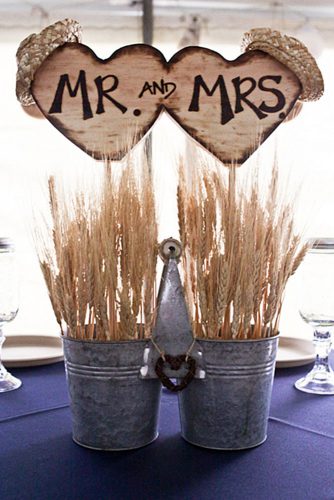 western wedding decoration in metal buckets spikelets and wooden hearts mr mrs one eleven images