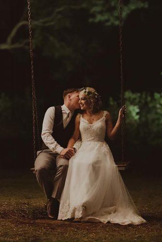 couple poses couple on swing olguinphotography