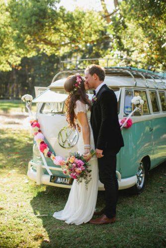 hippie wedding car bus decorated with bright garland and flowers ljm photography
