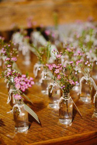 hippie wedding escort cards ideas with small glass bottles stacey hedman photography