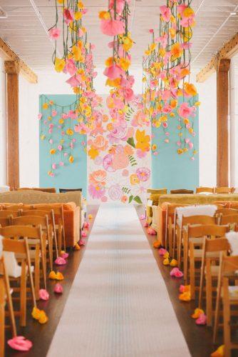 hippie wedding sky blue and bright blowers in wedding ceremony backdrop june bug company