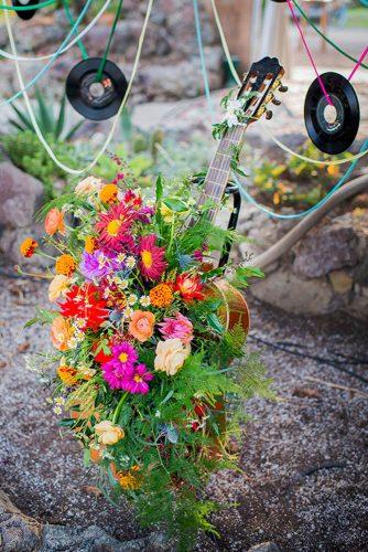 hippie wedding wildflowers in guitare décor kristen bienke