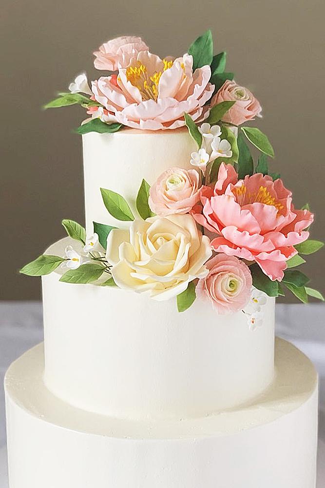 spring weddings cake with flower decor