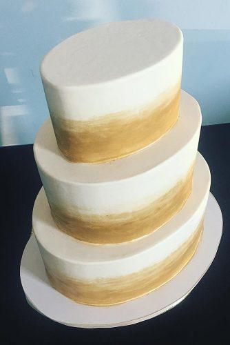 wedding cake shapes gold and white oval