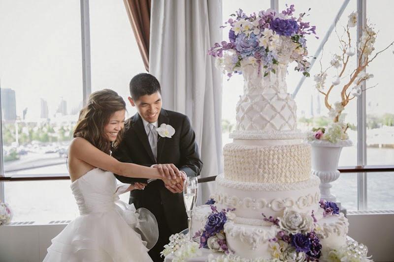 Bride and Groom Cutting the Wedding Cake