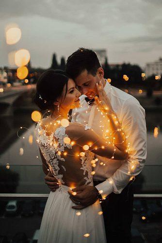 intimate wedding newlyweds together with lighting