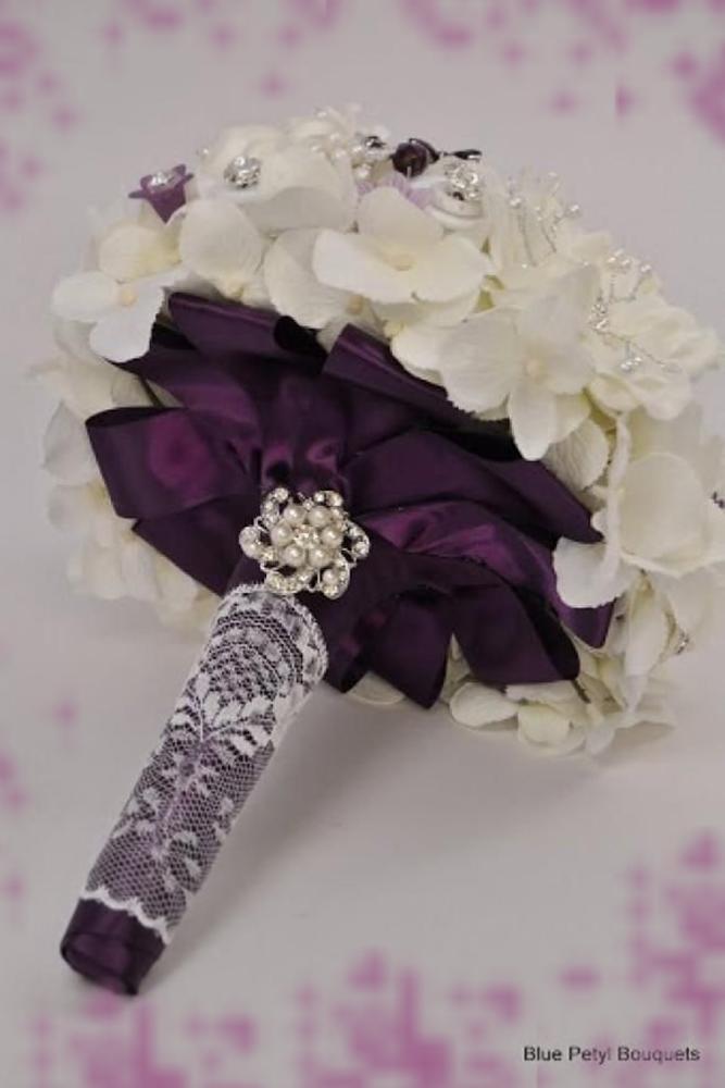 brooch wedding bouquets with purple ribbons and cristals