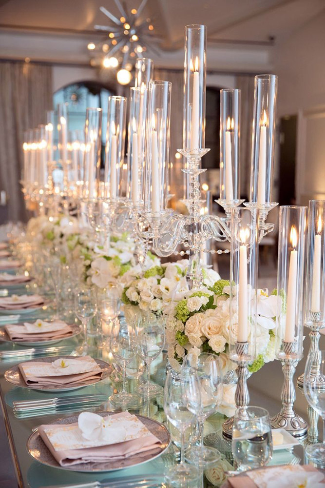 tall wedding centerpieces candlesticks white candles roses greens melikian photography