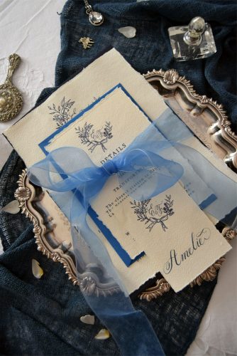 wedding monogram wedding letter with a monogram tied with a blue ribbon louise sinclair