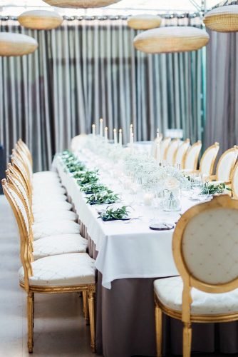 babys breath wedding ideas indoor reception table décor with white tablerunner and candles dieciucius