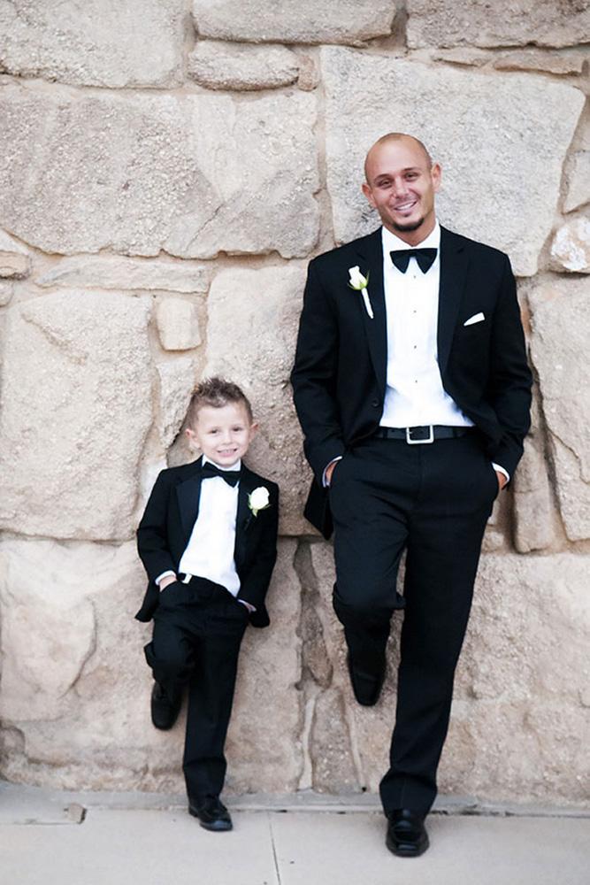 ring bearer a groom with boy near the wall two one photography