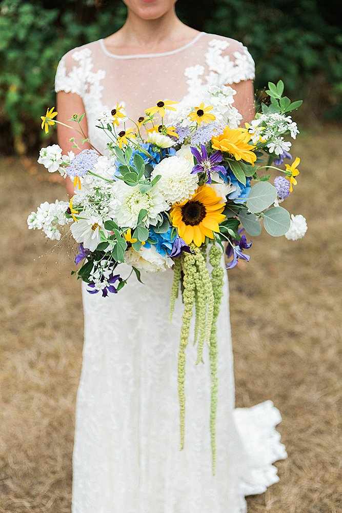 sunflower wedding bouquets with white flowers